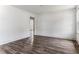 Spacious bedroom with wood-look floors and neutral paint, creating a serene atmosphere at 1543 Wickham St, Burlington, NC 27215