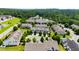Beautiful aerial view of a neighborhood featuring well-maintained homes surrounded by lush greenery and mature trees at 16 Daly Ct, Durham, NC 27705