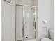 Bathroom showcases a shower with glass door and tile surround at 16 Daly Ct, Durham, NC 27705