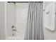 Clean bathroom with tub and shower, featuring modern hardware at 16 Daly Ct, Durham, NC 27705