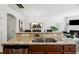 Open kitchen with a breakfast bar overlooking the dining and living areas at 16 Daly Ct, Durham, NC 27705