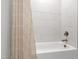 Bathroom featuring a shower with white marble style tile and bronze hardware at 164 E Spring Showers Trail Trl, Angier, NC 27501