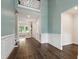 Bright entryway with high ceilings, dark wood floors, and wainscoting at 164 E Spring Showers Trail Trl, Angier, NC 27501