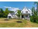 Beautiful exterior of a two-story home with stone accents and a well-maintained lawn at 164 E Spring Showers Trail Trl, Angier, NC 27501