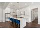 Spacious eat-in kitchen with a large island, bar seating, and modern appliances at 164 E Spring Showers Trail Trl, Angier, NC 27501