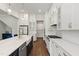 Gourmet kitchen boasts marble countertops, custom cabinets, and stainless steel appliances at 164 E Spring Showers Trail Trl, Angier, NC 27501