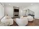 Bright and airy living room with hardwood floors and a stone fireplace feature at 164 E Spring Showers Trail Trl, Angier, NC 27501