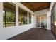 Spacious screened porch featuring stained wood ceiling and floors, plus access to the dining room at 164 E Spring Showers Trail Trl, Angier, NC 27501