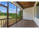 View of the screened porch with stained wood ceiling and flooring, offering great outdoor living at 164 E Spring Showers Trail Trl, Angier, NC 27501