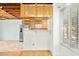 Open kitchen features stainless steel appliances and a breakfast bar, perfect for casual dining at 18 Frances St, Chapel Hill, NC 27517