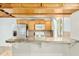 Traditional kitchen featuring granite countertops, wood cabinets, and modern appliances at 18 Frances St, Chapel Hill, NC 27517