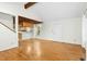 Open-concept living space with hardwood floors and a kitchen view, great for entertaining at 18 Frances St, Chapel Hill, NC 27517
