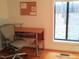 Home office featuring a modern desk and chair, with a bright window at 18 Frances St, Chapel Hill, NC 27517