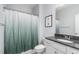 Clean bathroom with modern fixtures, granite vanity, and shower with curtain at 20 Ingate Way, Louisburg, NC 27549