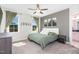 Cozy bedroom with a comfortable bed, soft lighting, and serene decor, creating a relaxing retreat at 20 Ingate Way, Louisburg, NC 27549