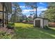Large backyard with mature trees and shed at 2003 Ryerson Dr, Garner, NC 27529