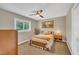Cozy bedroom featuring a ceiling fan, neutral walls, and a comfortable queen-sized bed at 2003 Ryerson Dr, Garner, NC 27529