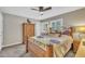 Inviting bedroom with a ceiling fan and natural light from two windows at 2003 Ryerson Dr, Garner, NC 27529
