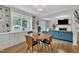 Bright dining area showcases hardwood floors, built-in shelving, and easy access to the living room, enhancing its charm at 2003 Ryerson Dr, Garner, NC 27529
