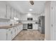Spacious kitchen with stainless steel appliances, granite countertops, and white subway tile backsplash at 2003 Ryerson Dr, Garner, NC 27529
