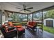 Covered patio with comfortable seating, ceiling fan, and view of backyard at 2003 Ryerson Dr, Garner, NC 27529