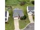 Aerial view of a brick home with a spacious driveway and large backyard at 2012 Summer Shire Way, Raleigh, NC 27604