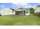 Enjoy the outdoors on the screened porch overlooking the backyard at 2012 Summer Shire Way, Raleigh, NC 27604