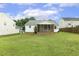 Enjoy the outdoors on the screened porch overlooking the backyard at 2012 Summer Shire Way, Raleigh, NC 27604