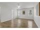 Bright bedroom features wood floors, ceiling fan, and windows with blinds at 2012 Summer Shire Way, Raleigh, NC 27604