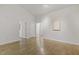 Spacious living room with wood-look flooring and natural light at 2012 Summer Shire Way, Raleigh, NC 27604