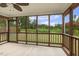 Relax on this screened porch overlooking the backyard and greenery at 2012 Summer Shire Way, Raleigh, NC 27604