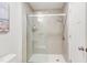 Bathroom with a modern glass-enclosed shower and tiled walls at 2014 Athens Ave, Durham, NC 27707