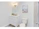 Well-lit bathroom featuring a vanity, modern fixtures, and neutral colors at 2014 Athens Ave, Durham, NC 27707