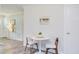 Bright breakfast nook featuring a round table, modern chairs, and stylish decor at 2014 Athens Ave, Durham, NC 27707