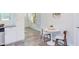 Cozy breakfast nook with a round table, two chairs, and plenty of natural light at 2014 Athens Ave, Durham, NC 27707