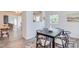 Inviting dining room with modern furniture and a view into the living room and kitchen at 2014 Athens Ave, Durham, NC 27707