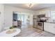 Open kitchen design with stainless steel appliances and easy access to the living room at 2014 Athens Ave, Durham, NC 27707