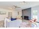 Bright living room features stylish decor and a stone fireplace at 2014 Athens Ave, Durham, NC 27707