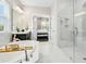 Bathroom with a soaking tub, walk-in shower, and access to the main bedroom at 205 Aurora Rd, Hillsborough, NC 27278