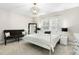 Bedroom featuring natural light, a ceiling fan and a bed at 205 Aurora Rd, Hillsborough, NC 27278