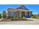 Exterior of a lovely clubhouse with stone accents and covered porch at 205 Aurora Rd, Hillsborough, NC 27278