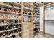 Custom walk-in closet with shelves and drawers for shoe storage at 205 Aurora Rd, Hillsborough, NC 27278