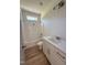 Well-lit bathroom with a shower-tub combo, white vanity, and modern fixtures, offering a functional design at 213 Maye St, Dunn, NC 28334