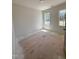 Spacious bedroom with two windows providing ample light, offering a blank canvas for customization at 213 Maye St, Dunn, NC 28334
