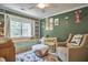 Bedroom bedroom featuring whimsical decor, a crib, and natural light at 216 Northwood Cir, Durham, NC 27701