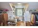Bright closet space with natural light, makeup table, and ample storage at 216 Northwood Cir, Durham, NC 27701