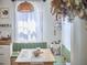 Eat-in kitchen with bench seating and a view from the window at 216 Northwood Cir, Durham, NC 27701