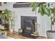 Elegant fireplace with decorative tile and mantel, showcasing vintage details at 216 Northwood Cir, Durham, NC 27701
