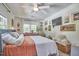 Comfortable main bedroom featuring bright natural light and plant decor at 216 Northwood Cir, Durham, NC 27701