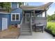 Backyard deck with a grill and stairs, connecting to a patio, perfect for summer entertaining at 2214 Pathway Dr, Chapel Hill, NC 27516